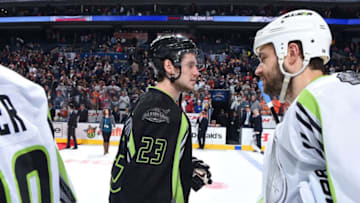 COLUMBUS, OH - JANUARY 25: Oliver Ekman-Larsson #23 of the Arizona Coyotes and Team Foligno and Brent Seabrook #7 of the Chicago Blackhawks and Team Toews shake hands after the 2015 Honda NHL All-Star Game at Nationwide Arena on January 25, 2015 in Columbus, Ohio. Team Toews defeated Team Foligno 17-12. (Photo by Brian Babineau/NHLI via Getty Images)