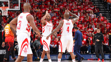 SALT LAKE CITY, UT - MAY 4: Trevor Ariza #1 of the Houston Rockets and PJ Tucker #4 of the Houston Rockets high-five during the game against the Utah Jazz during Game Three of the Western Conference Semifinals of the 2018 NBA Playoffs on May 4, 2018 at the Vivint Smart Home Arena Salt Lake City, Utah. NOTE TO USER: User expressly acknowledges and agrees that, by downloading and or using this photograph, User is consenting to the terms and conditions of the Getty Images License Agreement. Mandatory Copyright Notice: Copyright 2018 NBAE (Photo by Andrew D. Bernstein/NBAE via Getty Images)