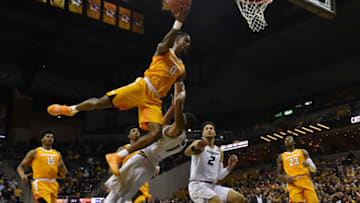 COLUMBIA, MISSOURI - JANUARY 08: Jordan Bone #0 of the Tennessee Volunteers draws a foul against Xavier Pinson #1 of the Missouri Tigers as he goes up for a basket in the first half at Mizzou Arena on January 08, 2019 in Columbia, Missouri. (Photo by Ed Zurga/Getty Images)