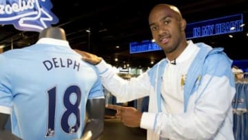 Fabian Delph shows off new Manchester City jersey (via Manchester City Facebook)