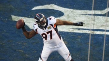 Feb 7, 2016; Santa Clara, CA, USA; Denver Broncos defensive end Malik Jackson (97) throws the ball into the stands after recovering a fumble for a touchdown in Super Bowl 50 at Levi
