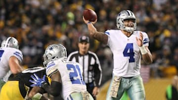 Nov 13, 2016; Pittsburgh, PA, USA; Dallas Cowboys quarterback Dak Prescott (4) throws a pass against the Pittsburgh Steelers during the second half of their game at Heinz Field. The Cowboys won the game, 35-30. Mandatory Credit: Jason Bridge-USA TODAY Sports