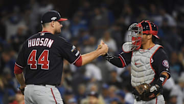 LOS ANGELES, CALIFORNIA - OCTOBER 04: Daniel Hudson #44 and Kurt Suzuki #28 of the Washington Nationals celebrate after the Nationals defeated the Los Angeles Dodgers 4 to 2 in game two of the National League Division Series at Dodger Stadium on October 04, 2019 in Los Angeles, California. (Photo by Harry How/Getty Images)