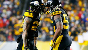 PITTSBURGH, PENNSYLVANIA - DECEMBER 15: Joe Haden #23 of the Pittsburgh Steelers celebrates with Devin Bush #55 during the second half against the Buffalo Bills in the game at Heinz Field on December 15, 2019 in Pittsburgh, Pennsylvania. (Photo by Justin K. Aller/Getty Images)