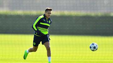 ST ALBANS, ENGLAND - MARCH 06: Alexis Sanchez of Arsenal chases down the ball during a training session at London Colney on March 6, 2017 in St Albans, England. (Photo by Dan Mullan/Getty Images)