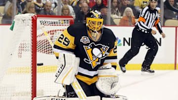 Oct 13, 2016; Pittsburgh, PA, USA; Pittsburgh Penguins goalie Marc-Andre Fleury (29) makes a save against the Washington Capitals during the third period at the PPG Paints Arena. The Penguins won 3-2 in a shootout. Mandatory Credit: Charles LeClaire-USA TODAY Sports