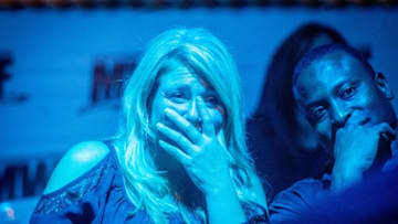Crowd members react to harsh wrestling moves at the Dollar Box in Hattiesburg, Ms., on Feb. 8, 2018.The Micro Wrestling Federation is a full scale, WWE type event sporting an entire cast under five feet tall. Founded in 2000, the MWF is the longest running organization within the Little Person wrestling industry according to its manager. / AFP PHOTO / Emily Kask (Photo credit should read EMILY KASK/AFP/Getty Images)
