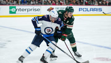 Winnipeg Jets, Andrew Copp (9); Minnesota Wild, Joel Eriksson Ek (14). Mandatory Credit: Brace Hemmelgarn-USA TODAY Sports