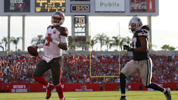 Nov 15, 2015; Tampa, FL, USA; Tampa Bay Buccaneers quarterback Jameis Winston (3) runs the ball in for a touchdown during the fourth quarter against the Dallas Cowboys at Raymond James Stadium. Mandatory Credit: Kim Klement-USA TODAY Sports