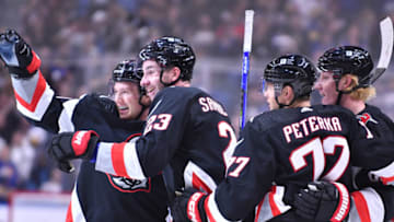 Oct 21, 2023; Buffalo, New York, USA; The Buffalo Sabres celebrate a goal by defenseman Mattias Samuelsson (23) against the New York Islanders in the second period at KeyBank Center. Mandatory Credit: Mark Konezny-USA TODAY Sports