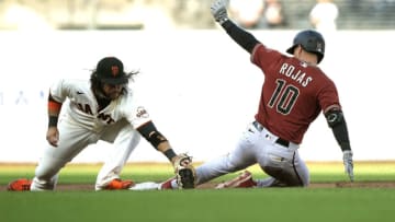 SAN FRANCISCO, CALIFORNIA - JUNE 16: Josh Rojas #10 of the Arizona Diamondbacks slides into second base with a lead off double against the San Francisco Giants in the top of the first inning at Oracle Park on June 16, 2021 in San Francisco, California. (Photo by Thearon W. Henderson/Getty Images)