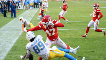 KANSAS CITY, MISSOURI - JANUARY 03: Darius Harris #47 of the Kansas City Chiefs breaks up a pass intended for Donald Parham #89 of the Los Angeles Chargers during the first half of the game at Arrowhead Stadium on January 03, 2021 in Kansas City, Missouri. (Photo by Jamie Squire/Getty Images)