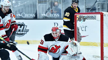 Feb 18, 2021; Boston, Massachusetts, USA; New Jersey Devils goaltender Mackenzie Blackwood (29) keeps his eye on the loose puck during the third period against the Boston Bruins at TD Garden. Mandatory Credit: Bob DeChiara-USA TODAY Sports