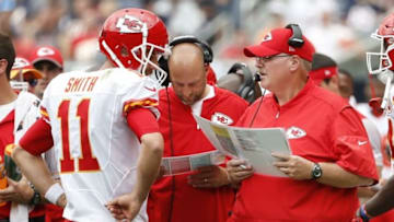 Aug 27, 2016; Chicago, IL, USA; Kansas City Chiefs quarterback Alex Smith (11) talks with head coach Andy Reid during a time out during the first half of the preseason game against the Chicago Bears at Soldier Field. Mandatory Credit: Kamil Krzaczynski-USA TODAY Sports
