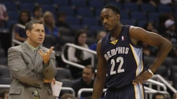 Oct 18, 2013; Orlando, FL, USA; Memphis Grizzlies head coach David Joerger talks with shooting guard Jamaal Franklin (22) against the Orlando Magic during the second half at Amway Center. Memphis Grizzlies defeated the Orlando Magic 97-91. Mandatory Credit: Kim Klement-USA TODAY Sports