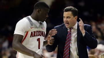 Dec 20, 2016; Tucson, AZ, USA; Arizona Wildcats head coach Sean Miller talks to guard Rawle Alkins (1) during the second half against the New Mexico Lobos at McKale Center. Arizona won 77-46. Mandatory Credit: Casey Sapio-USA TODAY Sports