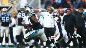 Feb 7, 2016; Santa Clara, CA, USA; Carolina Panthers defensive end Kony Ealy (94) returns an interception against the Denver Broncos in the second quarter in Super Bowl 50 at Levi
