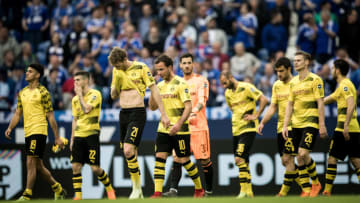GELSENKIRCHEN, GERMANY - APRIL 15: (EDITORS NOTE: Image has been digitally enhanced.) Players of Borussia Dortmund react after the Bundesliga match between FC Schalke 04 and Borussia Dortmund at Veltins-Arena on April 15, 2018 in Gelsenkirchen, Germany. (Photo by Maja Hitij/Bundesliga/DFL via Getty Images )