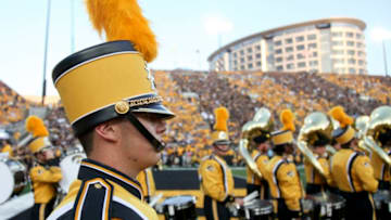 IOWA CITY, IOWA- SEPTEMBER 23: Members of the Iowa Hawkeye marching band perform before the match-up against the Penn State Nittany Lions on September 23, 2017 at Kinnick Stadium in Iowa City, Iowa. (Photo by Matthew Holst/Getty Images) *** Local Caption ***