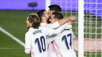 Real Madrid's Spanish forward Lucas Vazquez (R) celebrates with teammates after scoring a goal during the Spanish League football match between Real Madrid and Celta Vigo at the Alfredo Di Stefano stadium in Valdebebas, northeast of Madrid, on January 2, 2021. (Photo by OSCAR DEL POZO / AFP) (Photo by OSCAR DEL POZO/AFP via Getty Images)