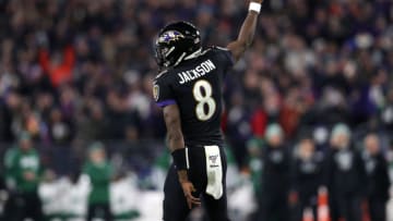 BALTIMORE, MARYLAND - DECEMBER 12: Quarterback Lamar Jackson #8 of the Baltimore Ravens celebrates after a touchdown in the first quarter of the game against the New York Jets at M&T Bank Stadium on December 12, 2019 in Baltimore, Maryland. (Photo by Patrick Smith/Getty Images)