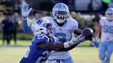 DURHAM, NC - NOVEMBER 10: Dominique Ross #3 of the North Carolina Tar Heels breaks up a pass to Deon Jackson #25 of the Duke Blue Devils during their game at Wallace Wade Stadium on November 10, 2018 in Durham, North Carolina. (Photo by Streeter Lecka/Getty Images)