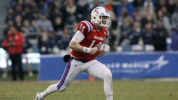 Dec 23, 2016; Fort Worth, TX, USA; Louisiana Tech Bulldogs quarterback Ryan Higgins (14) reacts to throwing a touchdown in the second quarter against the Navy Midshipmen at Amon G. Carter Stadium. Mandatory Credit: Tim Heitman-USA TODAY Sports