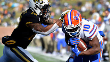 COLUMBIA, MISSOURI - NOVEMBER 16: Wide receiver Josh Hammond #10 of the Florida Gators catches a touchdown pass against safety Joshuah Bledsoe #18 of the Missouri Tigers in the third quarter at Faurot Field/Memorial Stadium on November 16, 2019 in Columbia, Missouri. (Photo by Ed Zurga/Getty Images)