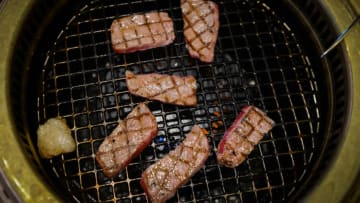 Slices of Kampo Wagyu beef steak sit on a grill at the Kounosuke grilled-beef restaurant owned by Seikou Sekimura in Kurihara, Miyagi, Japan, on Thursday, Nov. 24, 2016. Sekimura is betting that aficionados of Japan's Wagyu beef -- one of the world's most-expensive meats -- are ready for a diet version of the fat-laden, melt-in-your-mouth delicacy. Photographers: Noriko Hayashi/Bloomberg via Getty Images