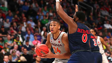 SAN JOSE, CALIFORNIA - MARCH 24: Kerry Blackshear Jr. #24 of the Virginia Tech Hokies handles the ball against Myo Baxter-Bell #0 of the Liberty Flames in the second half during the second round of the 2019 NCAA Men's Basketball Tournament at SAP Center on March 24, 2019 in San Jose, California. (Photo by Yong Teck Lim/Getty Images)