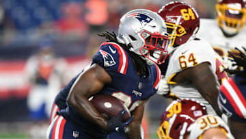 Aug 12, 2021; Foxborough, Massachusetts, USA; New England Patriots running back Rhamondre Stevenson (38) rushes for a touchdown against the Washington Football Team during the second half at Gillette Stadium. Mandatory Credit: Brian Fluharty-USA TODAY Sports