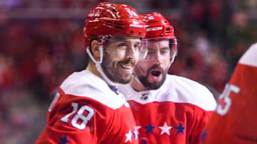 WASHINGTON, DC - DECEMBER 27: Washington Capitals center Chandler Stephenson (18) is congratulated by defenseman Matt Niskanen (2) after scoring in the second period against the Carolina Hurricanes on December 27, 2018, at the Capital One Arena in Washington, D.C. (Photo by Mark Goldman/Icon Sportswire via Getty Images)