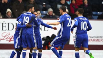 BURNLEY, ENGLAND - FEBRUARY 12: Pedro of Chelsea celebrates scoring his sides first goal with team mates during the Premier League match between Burnley and Chelsea at Turf Moor on February 12, 2017 in Burnley, England. (Photo by Clive Brunskill/Getty Images)