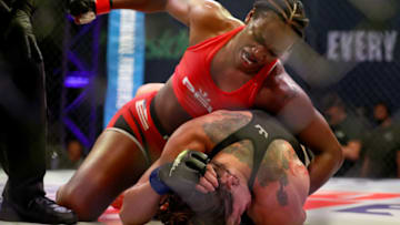 ATLANTIC CITY, NEW JERSEY - JUNE 10: Claressa Shields of the United States punches Brittney Elkin of the United States during the third round of their lightweight bout in Ovation Hall at Ocean Casino Resort on June 10, 2021 in Atlantic City, New Jersey. (Photo by Elsa/Getty Images)