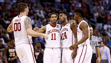 Mar 20, 2016; Oklahoma City, OK, USA; Oklahoma Sooners guard Buddy Hield (24) and guard Isaiah Cousins (11) and forward Ryan Spangler (00) and guard Christian James (3) during the game against the Virginia Commonwealth Rams in the second round of the 2016 NCAA Tournament at Chesapeake Energy Arena. Mandatory Credit: Kevin Jairaj-USA TODAY Sports