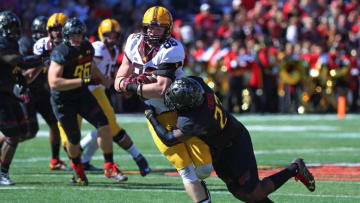 Oct 15, 2016; College Park, MD, USA; Minnesota Golden Gophers tight end Brandon Lingen (86) tackled after a catch by Maryland Terrapins linebacker Jermaine Carter (23) at Byrd Stadium. Mandatory Credit: Mitch Stringer-USA TODAY Sports