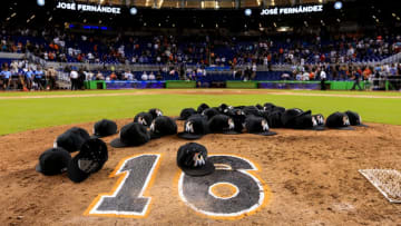 MIAMI, FL - SEPTEMBER 26: Miami Marlins leave their hats on the pitching mound to honor the late Jose Fernandez after the game against the New York Mets at Marlins Park on September 26, 2016 in Miami, Florida. (Photo by Rob Foldy/Getty Images)