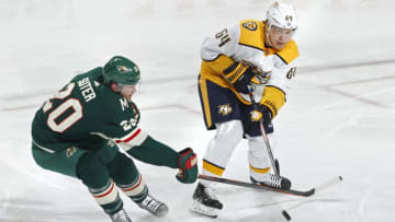ST. PAUL, MN - MARCH 03: This shot attempt by Ryan Suter #20 of the Minnesota Wild is broken up by Mikael Granlund #64 of the Nashville Predators during a game at Xcel Energy Center on March 3, 2019 in St. Paul, Minnesota.(Photo by Bruce Kluckhohn/NHLI via Getty Images)
