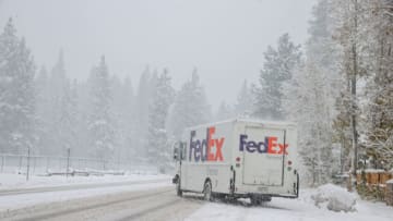 CALIFORNIA, USA - NOVEMBER 8: A FedEx truck is seen as snow blanked South Lake Tahoe in California, United States on November 8, 2022. Winter Storm warning in effect for Lake Tahoe and Nevada mountains. (Photo by Tayfun Coskun/Anadolu Agency via Getty Images)