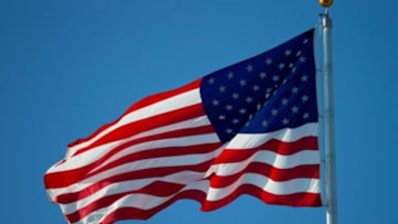 Sep 3, 2015; Green Bay, WI, USA; The American flag flies prior to the game between the New Orleans Saints and Green Bay Packers at Lambeau Field. Green Bay won 38-10. Mandatory Credit: Jeff Hanisch-USA TODAY Sports