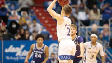 Kansas sophomore guard Christian Braun shoots for three in the first half of Tuesday's Sunflower Showdown against Kansas State inside Allen Fieldhouse. The Jayhawks won 74-51.