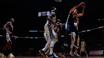 DENVER, CO - NOVEMBER 24: Nikola Jokic #15 of the Denver Nuggets grabs a rebound against the Memphis Grizzlies on November 24, 2017 at the Pepsi Center in Denver, Colorado. NOTE TO USER: User expressly acknowledges and agrees that, by downloading and/or using this photograph, user is consenting to the terms and conditions of the Getty Images License Agreement. Mandatory Copyright Notice: Copyright 2017 NBAE (Photo by Bart Young/NBAE via Getty Images)