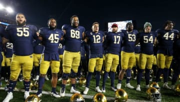 SOUTH BEND, INDIANA - NOVEMBER 16: The Notre Dame Fighting Irish sing after beating the Navy Midshipmen 52-20 at Notre Dame Stadium on November 16, 2019 in South Bend, Indiana. (Photo by Dylan Buell/Getty Images)