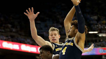 CHAPEL HILL, NC - NOVEMBER 29: Teammates Isaiah Livers