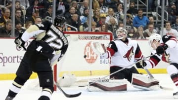 Feb 29, 2016; Pittsburgh, PA, USA; Pittsburgh Penguins right wing Patric Hornqvist (72) scores his third goal of the game past Arizona Coyotes goalie Louis Domingue (35) during the second period at the CONSOL Energy Center. Mandatory Credit: Charles LeClaire-USA TODAY Sports