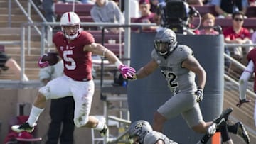 October 22, 2016; Stanford, CA, USA; Stanford Cardinal running back Christian McCaffrey (5) runs past Colorado Buffaloes defensive back Ryan Moeller (25, bottom) and linebacker Rick Gamboa (32, top right) during the fourth quarter at Stanford Stadium. Mandatory Credit: Kyle Terada-USA TODAY Sports