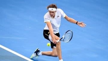 BRISBANE, AUSTRALIA - FEBRUARY 02: Alexander Zverev of Germany plays a backhand against Alex de Minaur of Australia during the Davis Cup World Group First Round tie between Australia and Germany at Pat Rafter Arena on February 2, 2018 in Brisbane, Australia. (Photo by Bradley Kanaris/Getty Images)