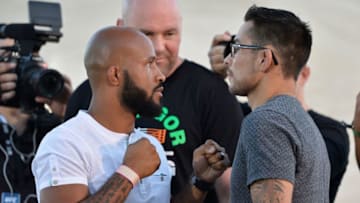 LAS VEGAS, NV - AUGUST 24: (L-R) UFC flyweight champion Demetrious Johnson and Ray Borg face off during the UFC 215