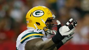 ATLANTA, GA - OCTOBER 30: Mike Daniels #76 of the Green Bay Packers reacts after sacking Mohamed Sanu #12 of the Atlanta Falcons at Georgia Dome on October 30, 2016 in Atlanta, Georgia. (Photo by Kevin C. Cox/Getty Images)