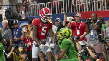 ATLANTA, GA - SEPTEMBER 3: Adonai Mitchell #5 of the Georgia Bulldogs celebrates a touchdown during a game between Oregon Ducks and Georgia Bulldogs at Mercedes-Benz Stadium on September 3, 2022 in Atlanta, Georgia. (Photo by Steve Limentani/ISI Photos/Getty Images)